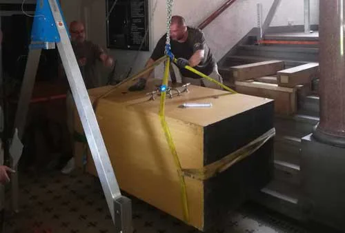 Transporting a safe up stairs